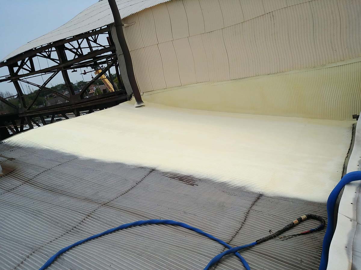 Spray foam roofing applied over corrugated metal roof in Waterford Michigan